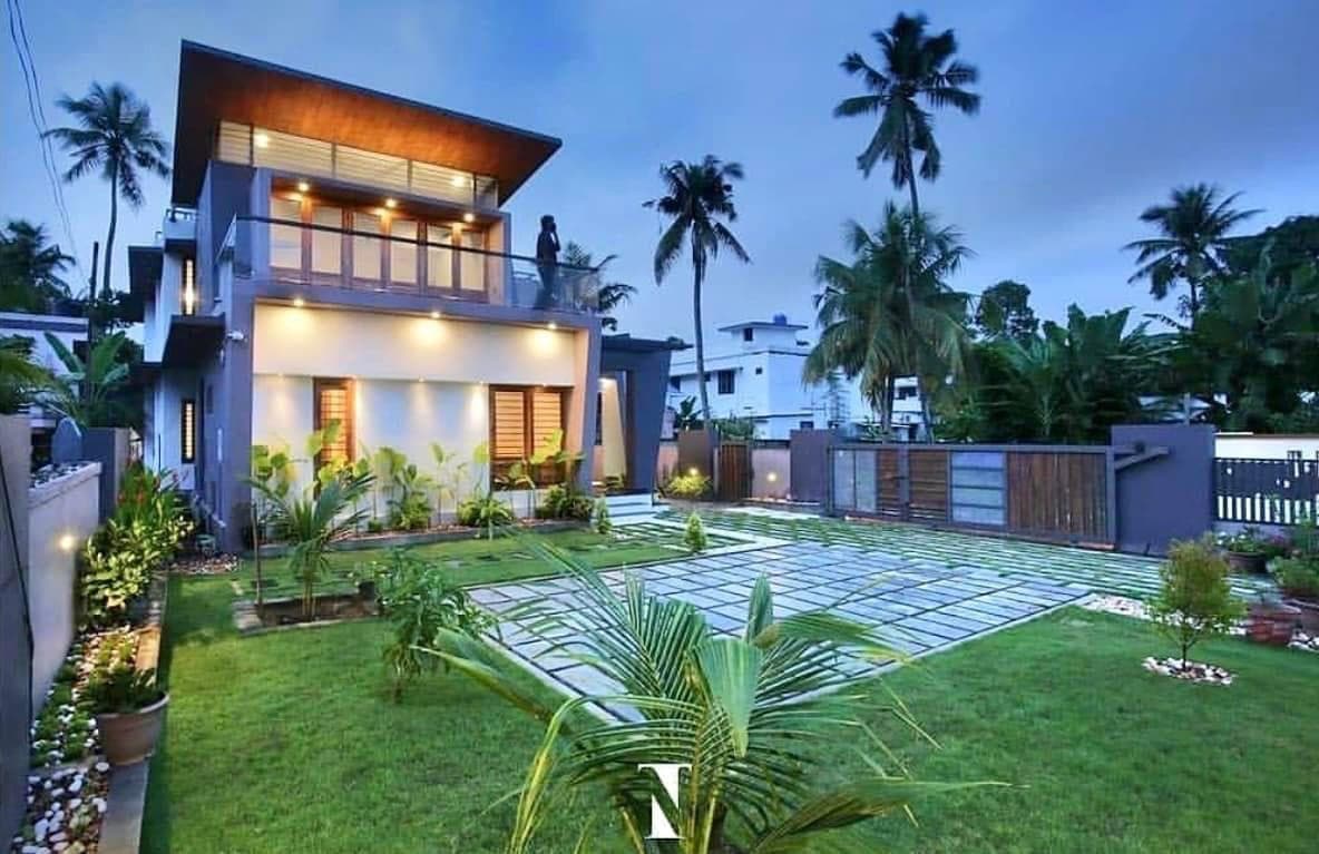 Ozone Landscapes Premium Kerala Villa at Dusk